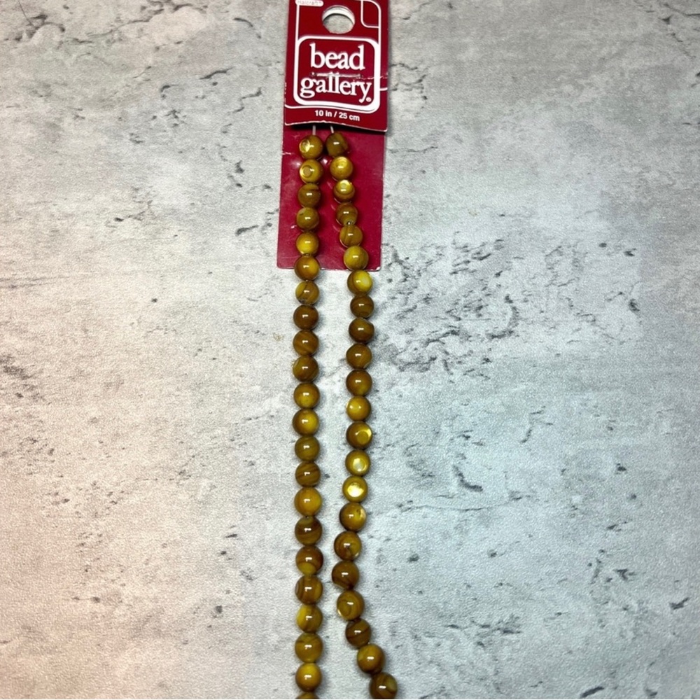 NWT Amber Shell Round Spacer Beads
